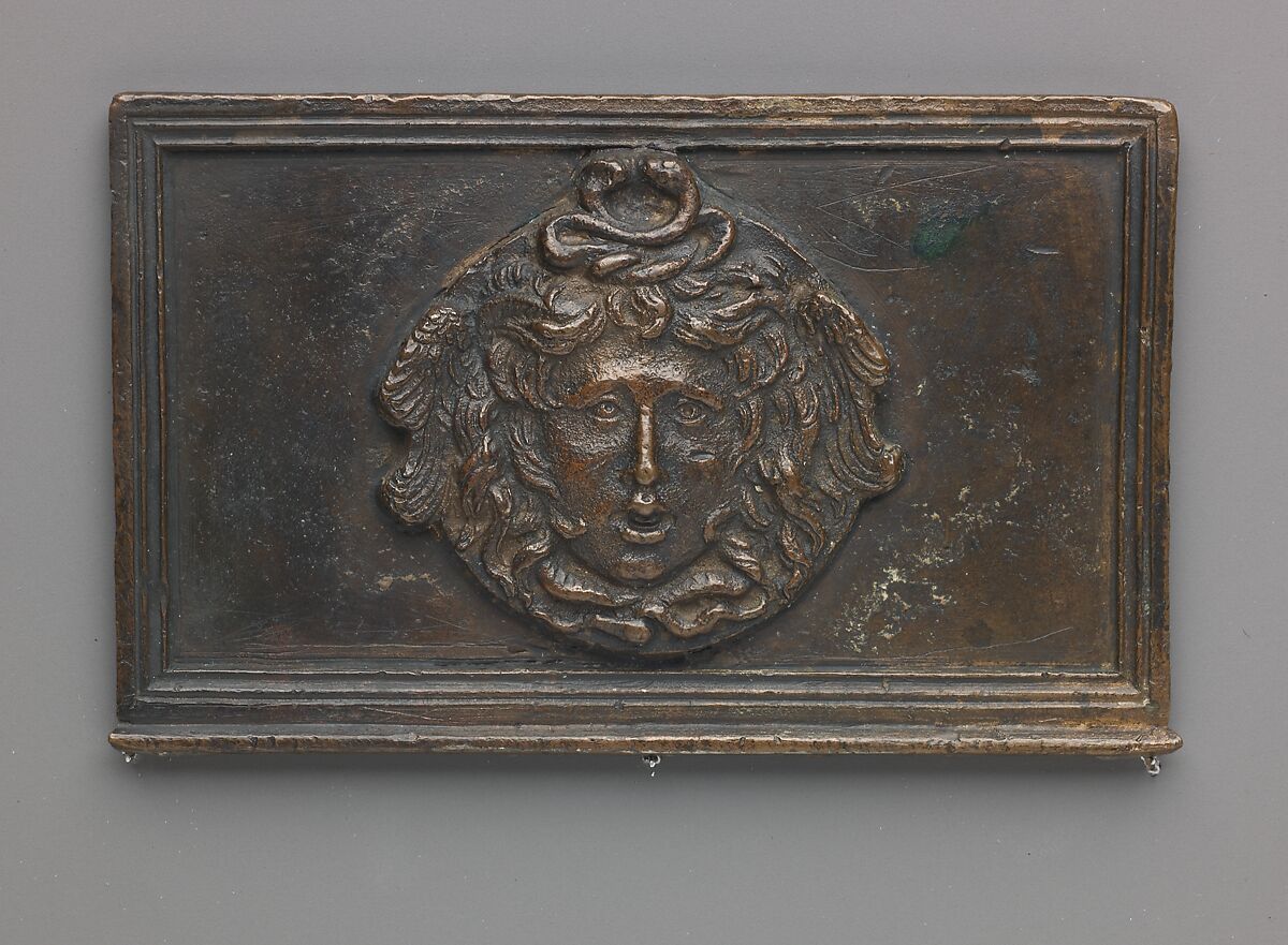 Side panel of a writing box (decorated with Medusa mask), model attributed to Severo Calzetta da Ravenna (Italian, active by 1496, died before 1543), Copper alloy with warm brown patina and areas of a worn black patina on top.