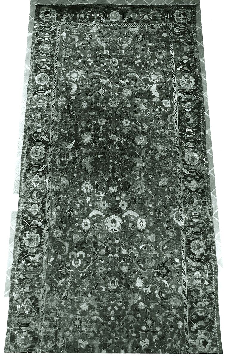 Indo-Persian carpet with vine scroll and palmette pattern, Wool pile on cotton foundation., Indo-Persian
