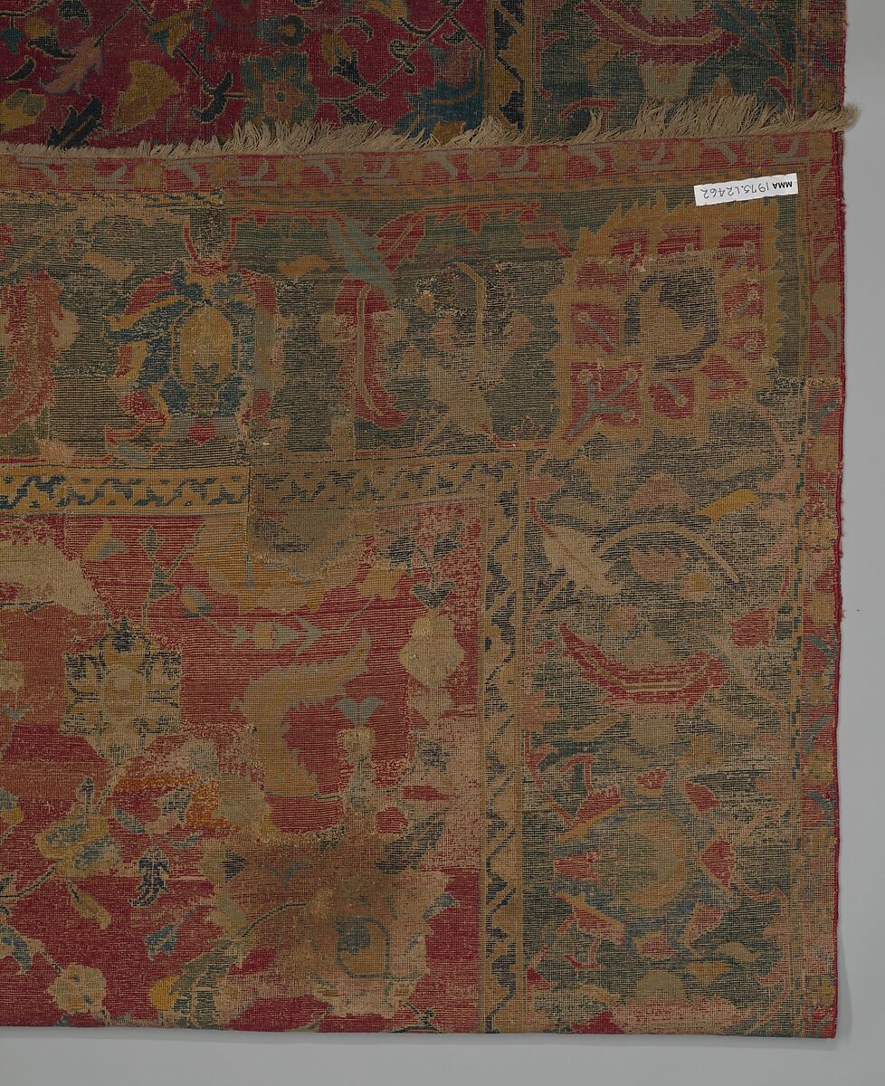 Indo-Persian carpet with vine scroll and palmette pattern, Wool pile on cotton foundation., Indo-Persian