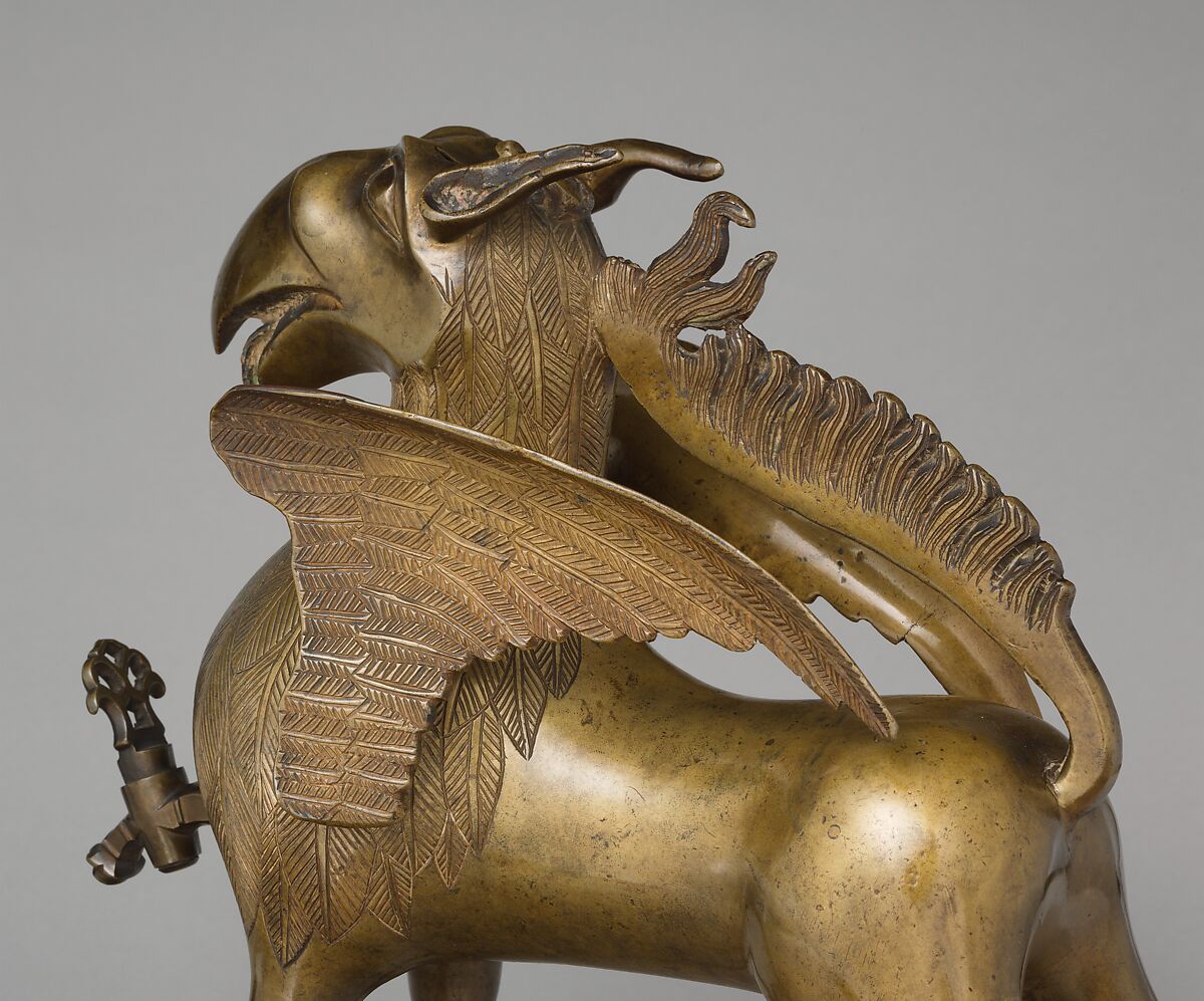 Aquamanile in the Form of a Griffin, Bronze; Ternary copper alloy with a very high content of zinc (approx. 74%
copper, approx. 22% zinc, approx. 2% lead) with natural patina, hollow cast., German, Nuremberg
