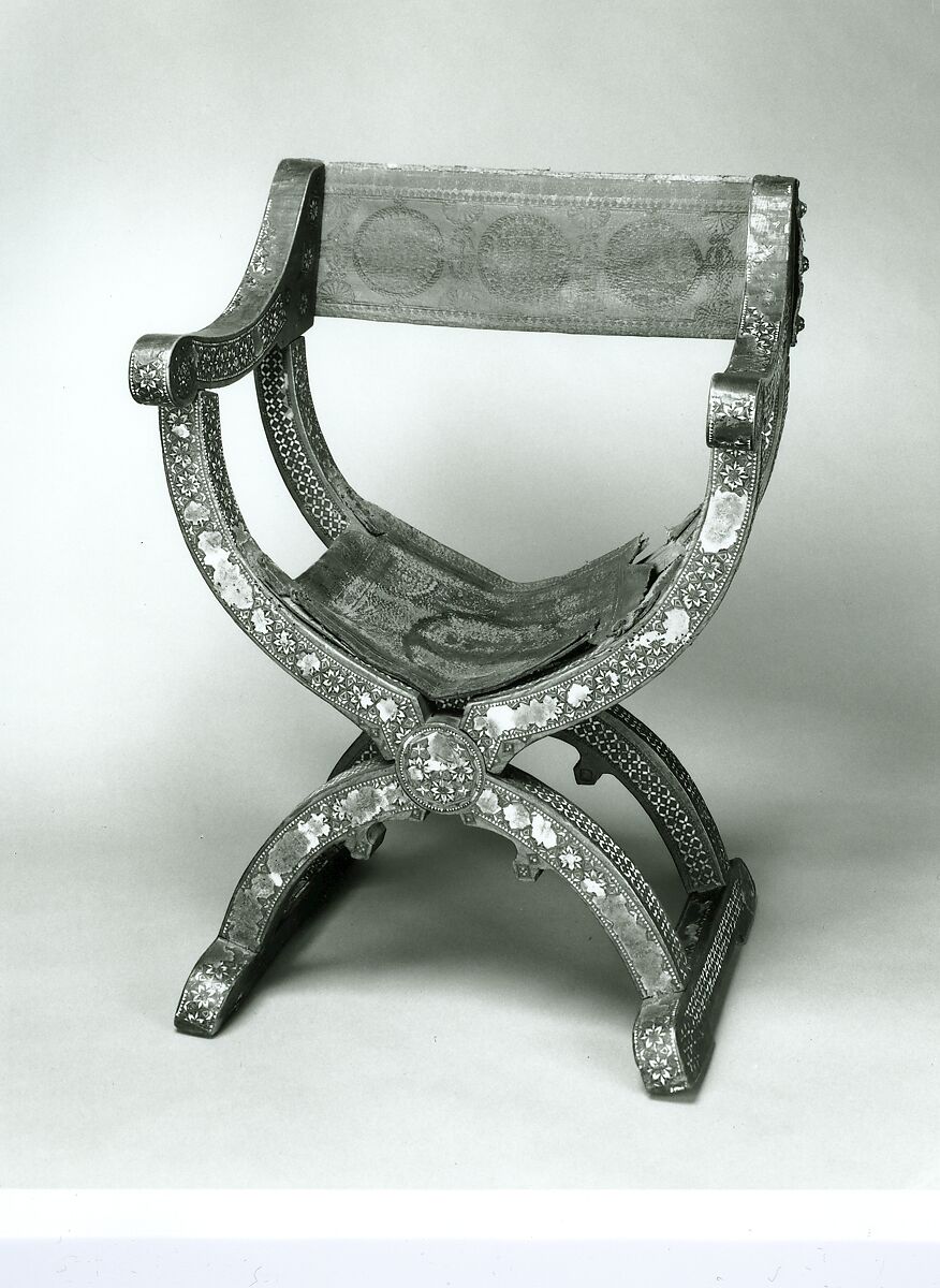 Hip-joint armchair (sillón de cadera or jamuga), Walnut, elm, other woods, ivory, mother-of-pearl, pewter, parchment; leather, tooled., Spanish (Granada?), Hispano-Moresque