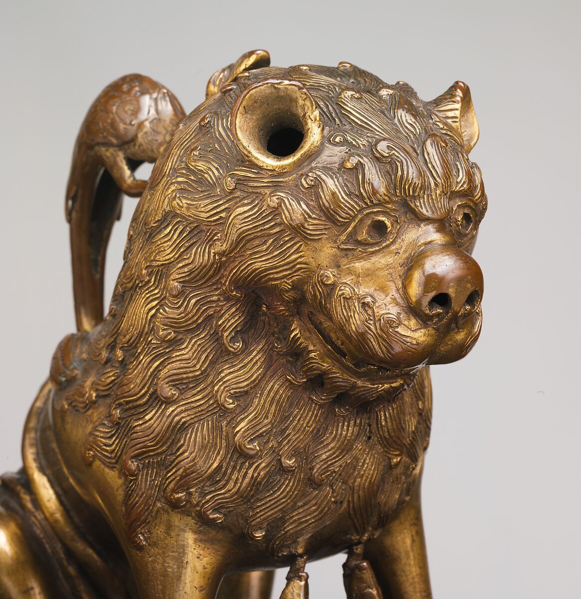 Aquamanile in the Form of a Lion, Bronze; binary copper alloy (approx. 88% copper, approx. 8% tin) hollow cast,
chased, engraved, and gilded., North German, Lubeck (?)