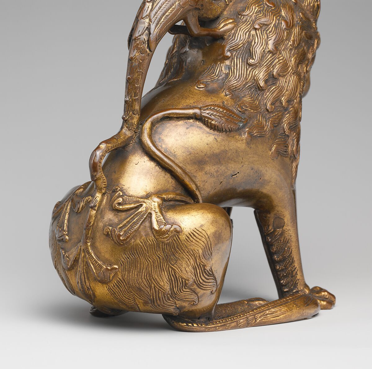 Aquamanile in the Form of a Lion, Bronze; binary copper alloy (approx. 88% copper, approx. 8% tin) hollow cast,
chased, engraved, and gilded., North German, Lubeck (?)