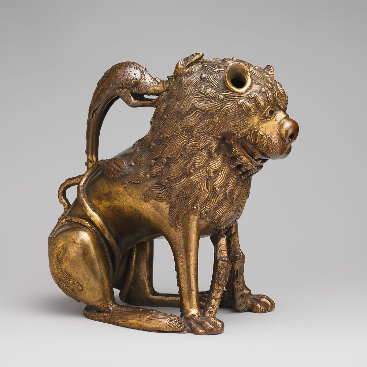 Aquamanile in the Form of a Lion, Bronze; binary copper alloy (approx. 88% copper, approx. 8% tin) hollow cast,
chased, engraved, and gilded., North German, Lubeck (?)