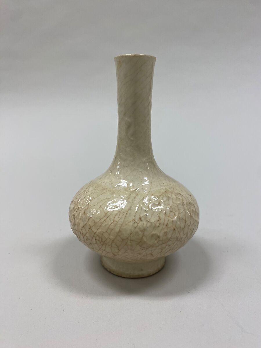 Bottle vase, Porcelain with molded decoration under crackled white glaze (Jingdezhen ware), China 