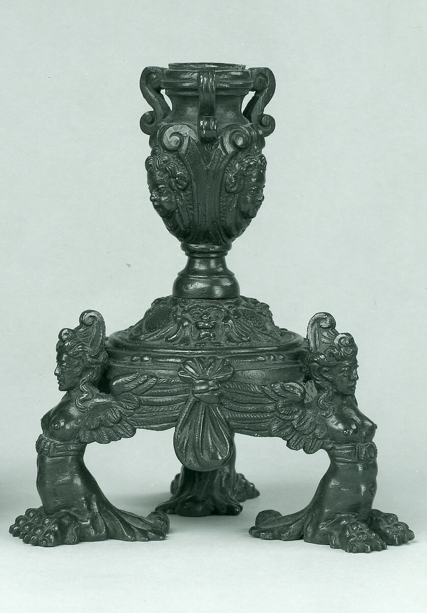 Candlestick supported by three female demi-figures (pair with .1378), Copper alloy with a reddish to brown patina and remnants of a black lacquer patina., Italian, Venice 