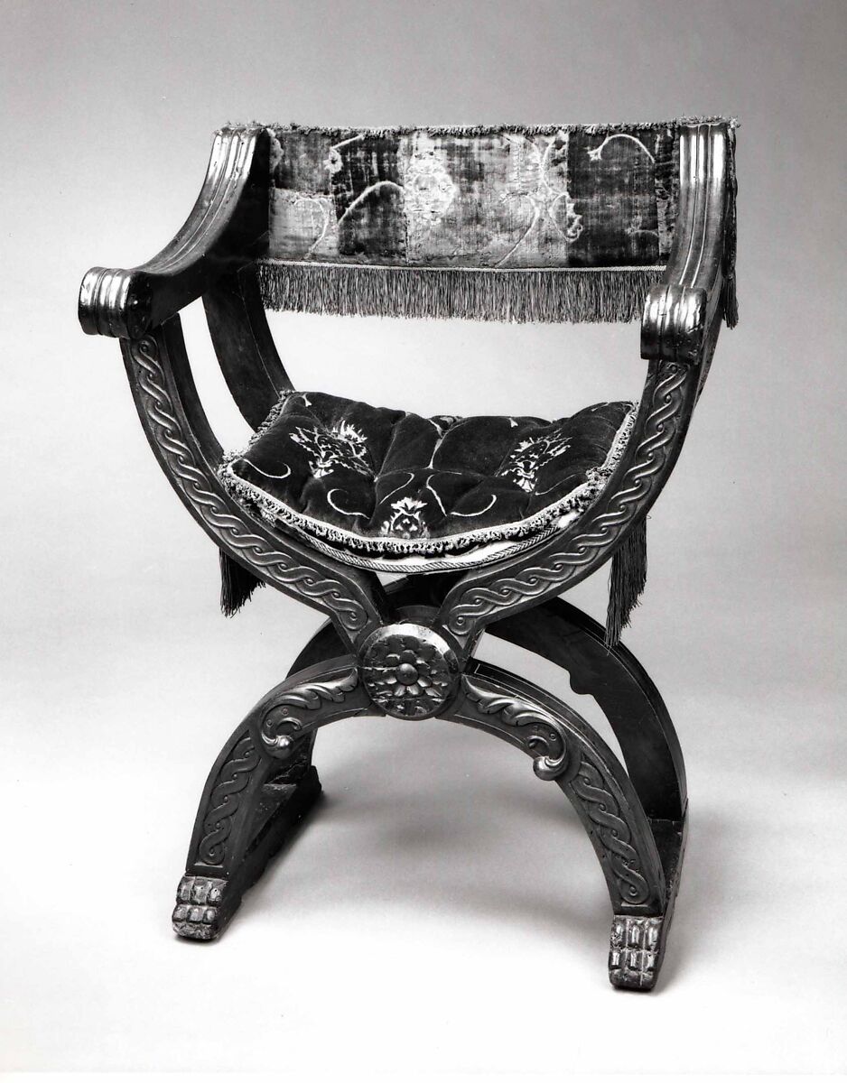 Hip-joint armchair (Dantesca type, associated with 1975.1.1975 a,b), Walnut, carved; silk cut velvet, metal., Italian 