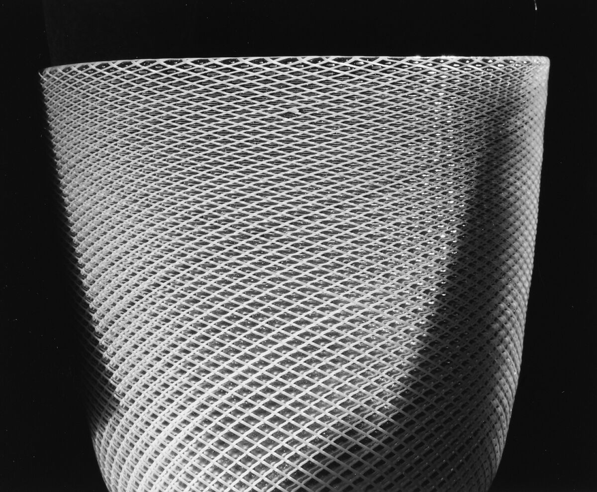 Colorless (slightly tan) and opaque white nonlead glass. Blown, "vetro a reticello"., Italian, Venice