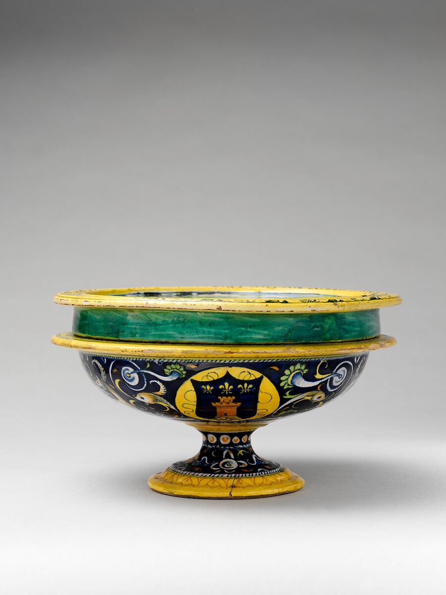 Broth bowl and cover (scodella and tagliere) from an accouchement set; Aeneas leaving Troy with his father and son (inside bowl); Pyramis and Thisbe (on cover), Baldassare Manara (Italian, Faenza, active first half 16th century), Maiolica (tin-glazed earthenware)