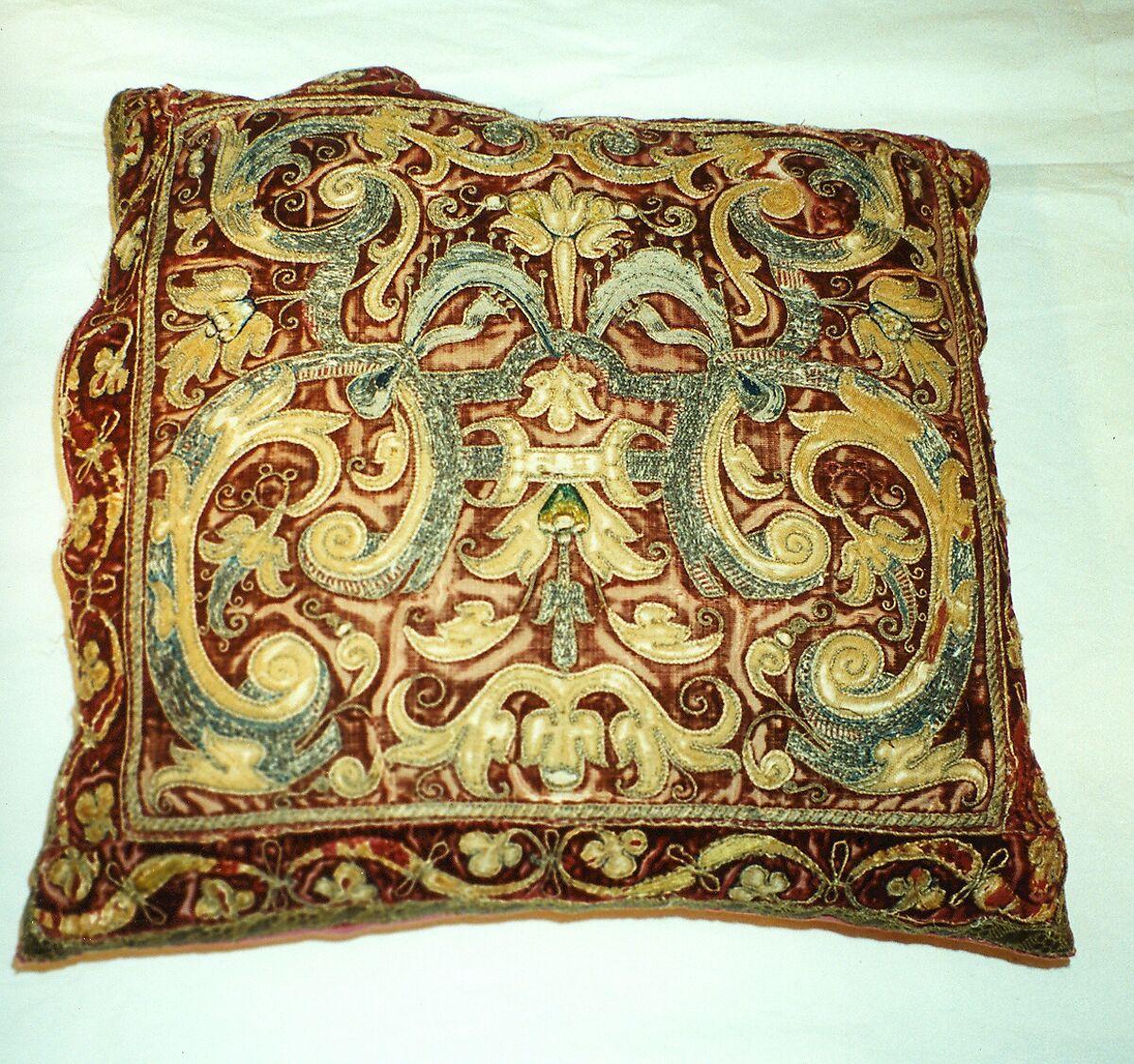 Apparel made into a cushion, silk; metal;, Italian 