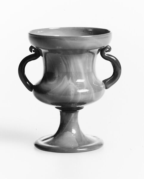 Vase, probably Giuseppe Barovier (Italian, 1853–1942), Translucent amber nonlead glass with multicolored marbling on the exterior. Blown.