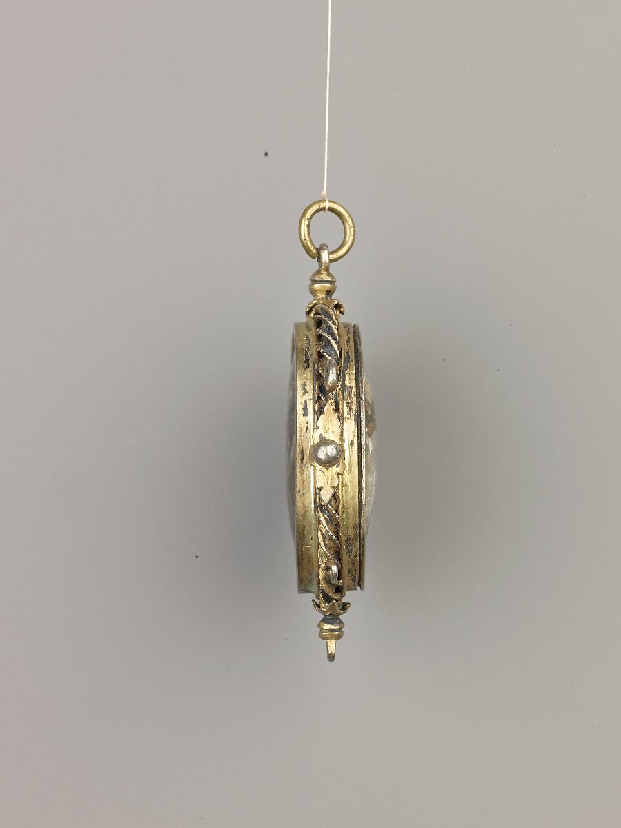 Devotional pendant, Cut and polished reversed-painted and reverse-gilt rock crystal; silver gilt. Assembled., probably Spanish