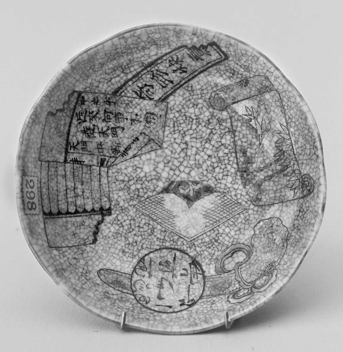 Dish with scholar objects, Porcelain painted in overglaze polychrome enamels (Jingdezhen ware), China