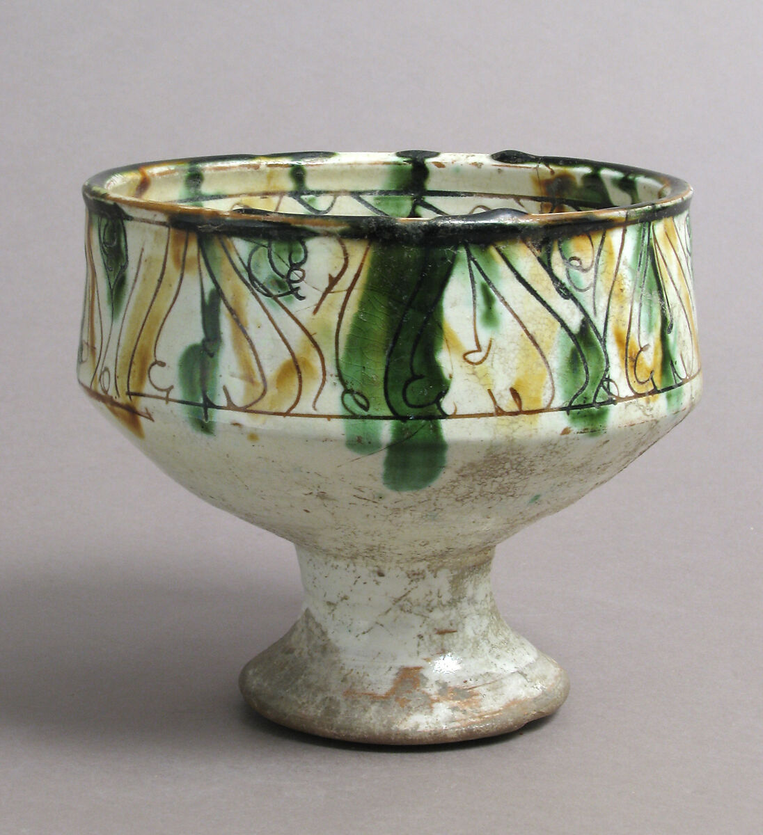 Footed cup with palmettes, Earthenware, glazed, Byzantine