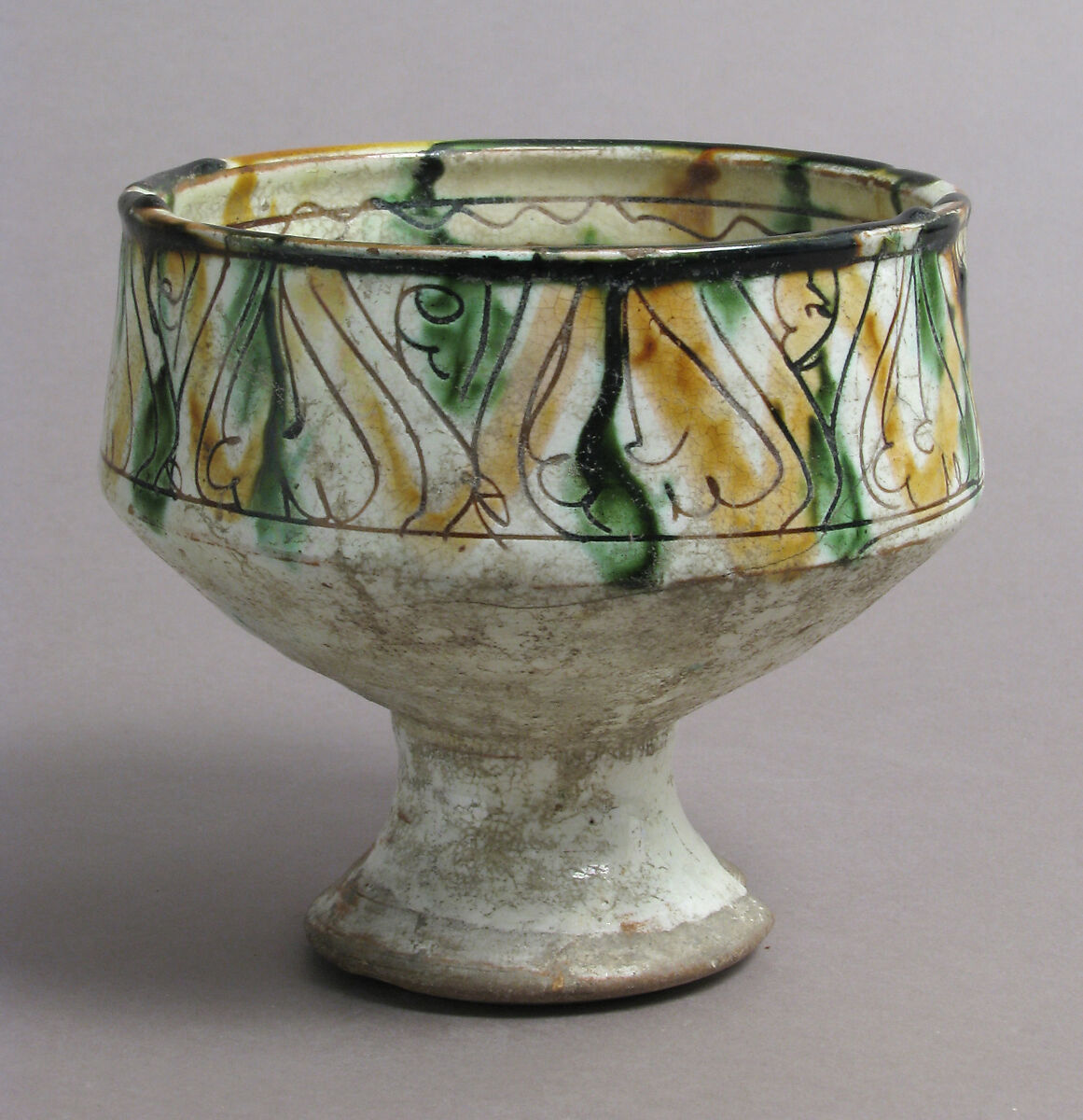 Footed cup with palmettes, Earthenware, glazed, Byzantine