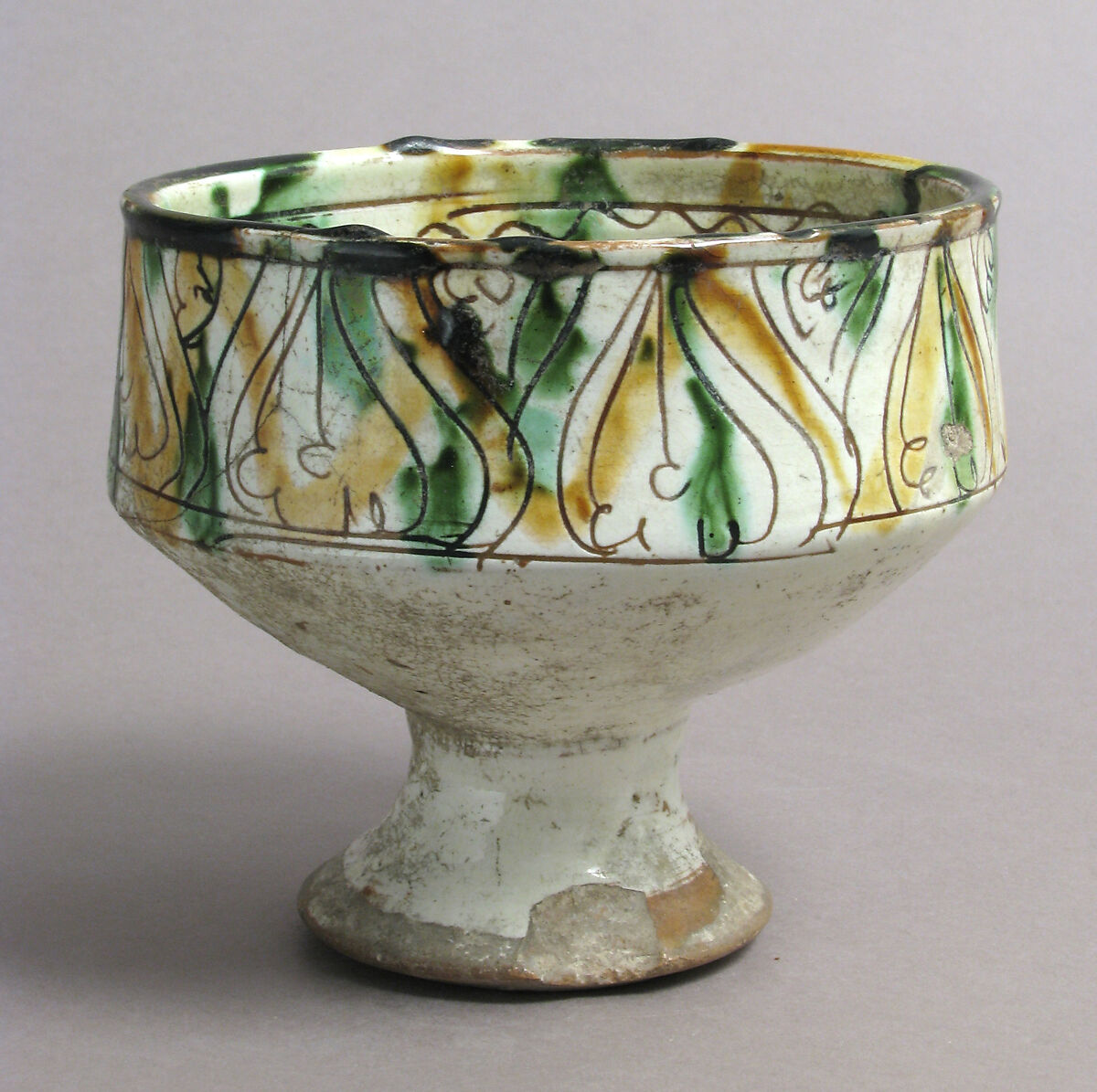Footed cup with palmettes, Earthenware, glazed, Byzantine