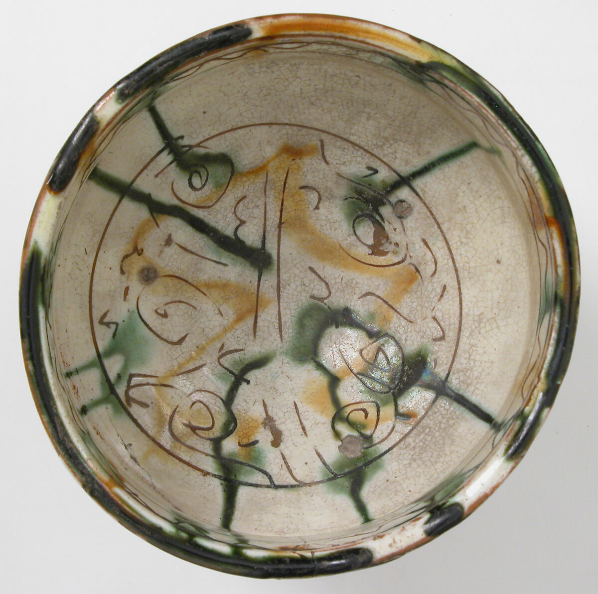 Footed cup with palmettes, Earthenware, glazed, Byzantine