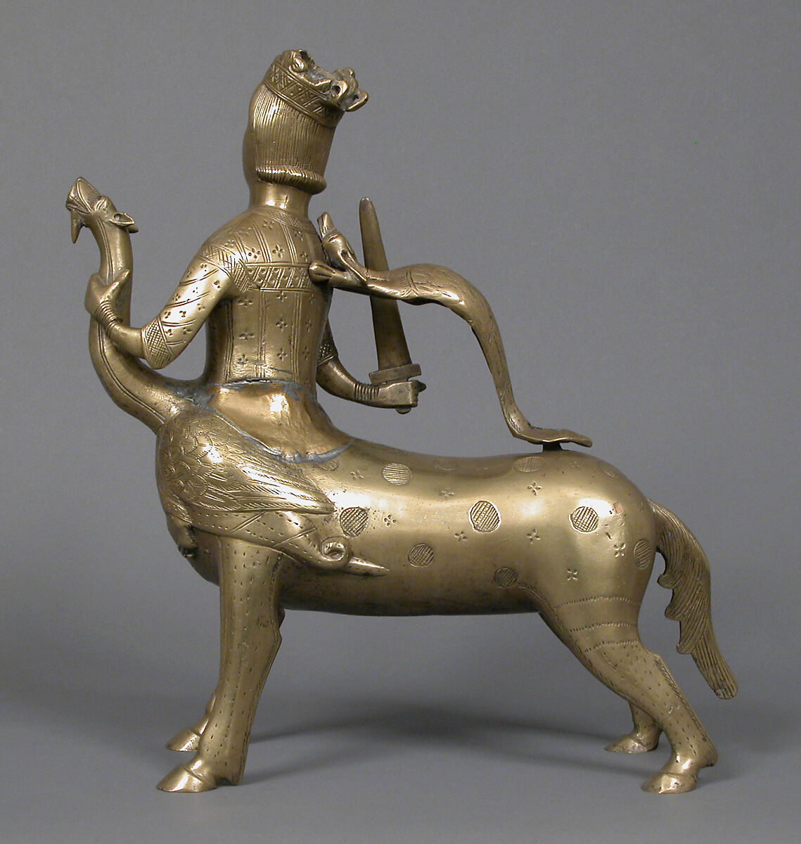 Aquamanile in the Form of a Crowned Centaur Fighting a Dragon, Copper alloy, German
