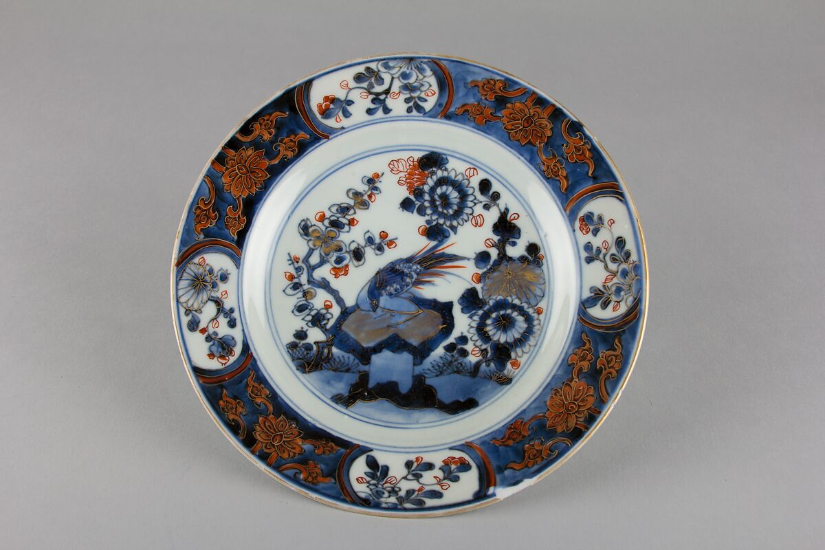 Plate with bird and flowers, Porcelain painted in underglaze blue and overglaze iron red, China 