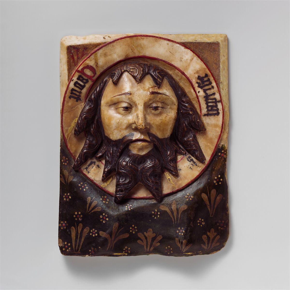 Plaque with the Head of Saint John the Baptist on a Charger, School of Nottingham (British), Alabaster with paint and gilding, British