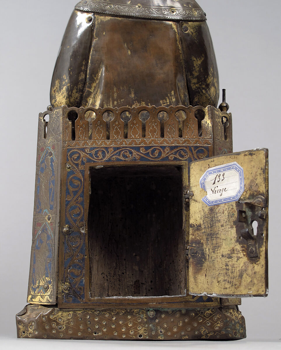 Virgin and Child, Copper: repoussé, engraved, gilt, cut out and nailed; champlevé enamel: lapis and light blue, red; gems; wood core (walnut), French