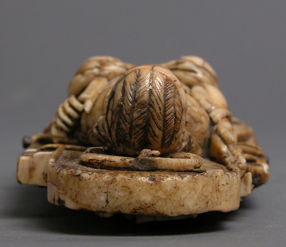 Pectoral with Christ and the Lamb of God and the Symbols of the Four Evangelists, Walrus ivory with gilt-copper sheets and copper alloy pin, British or North French
