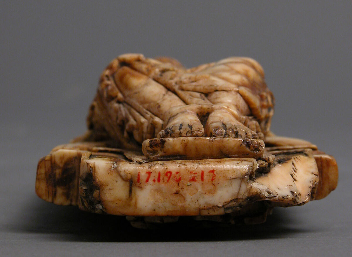 Pectoral with Christ and the Lamb of God and the Symbols of the Four Evangelists, Walrus ivory with gilt-copper sheets and copper alloy pin, British or North French