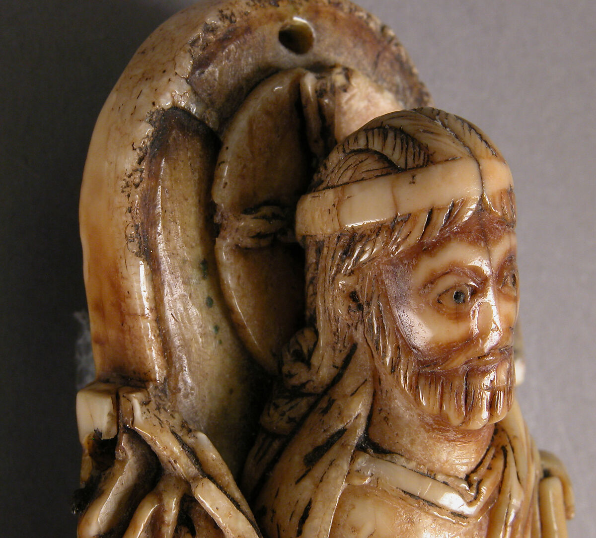 Pectoral with Christ and the Lamb of God and the Symbols of the Four Evangelists, Walrus ivory with gilt-copper sheets and copper alloy pin, British or North French