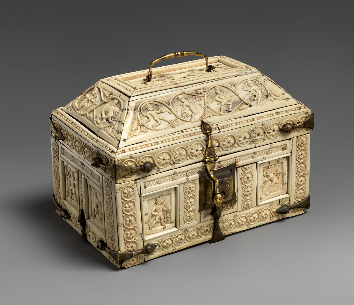 Casket with Warriors and Dancers, Elephant ivory and bone; gilded copper mounts, Byzantine