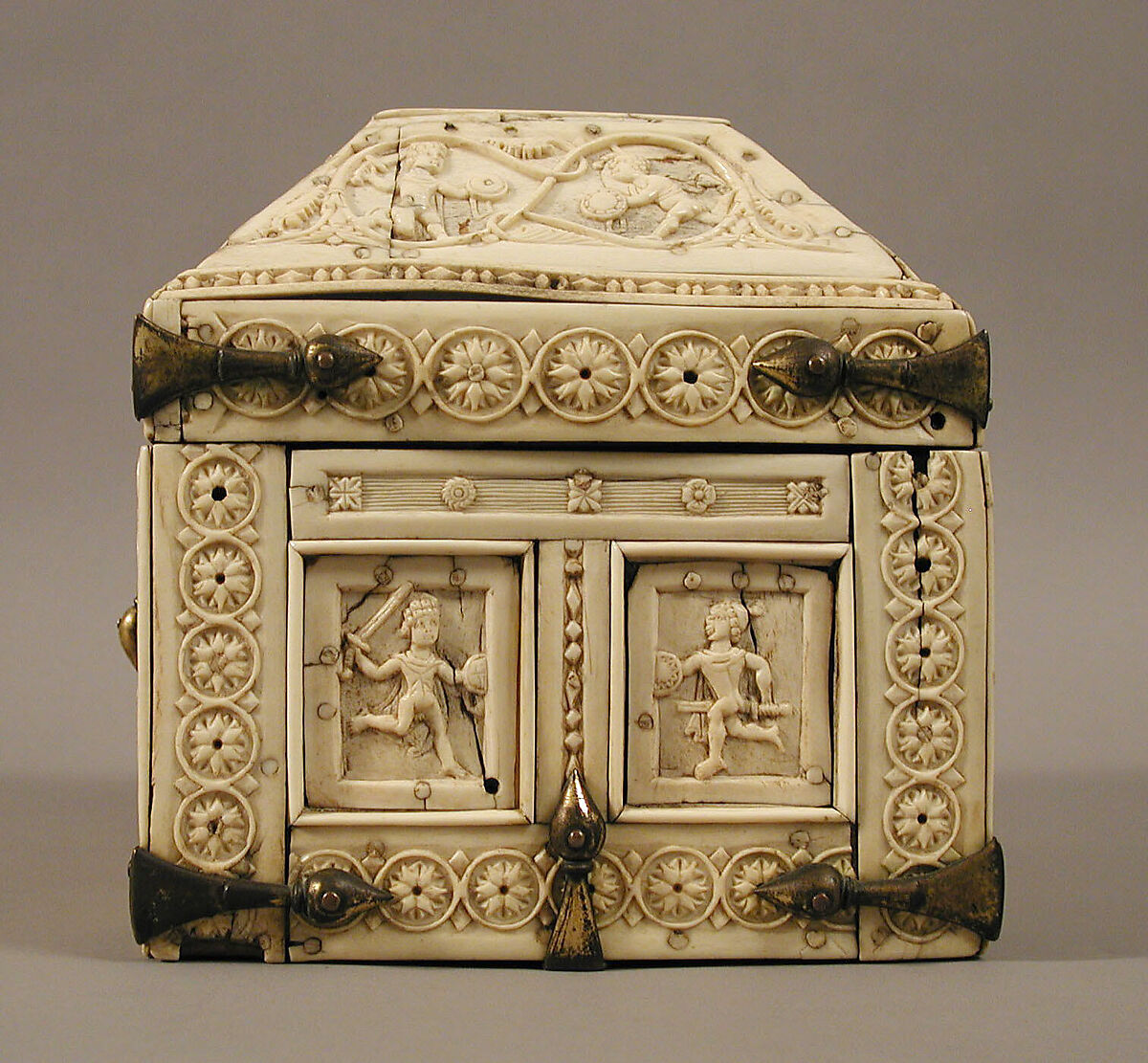 Casket with Warriors and Dancers, Elephant ivory and bone; gilded copper mounts, Byzantine
