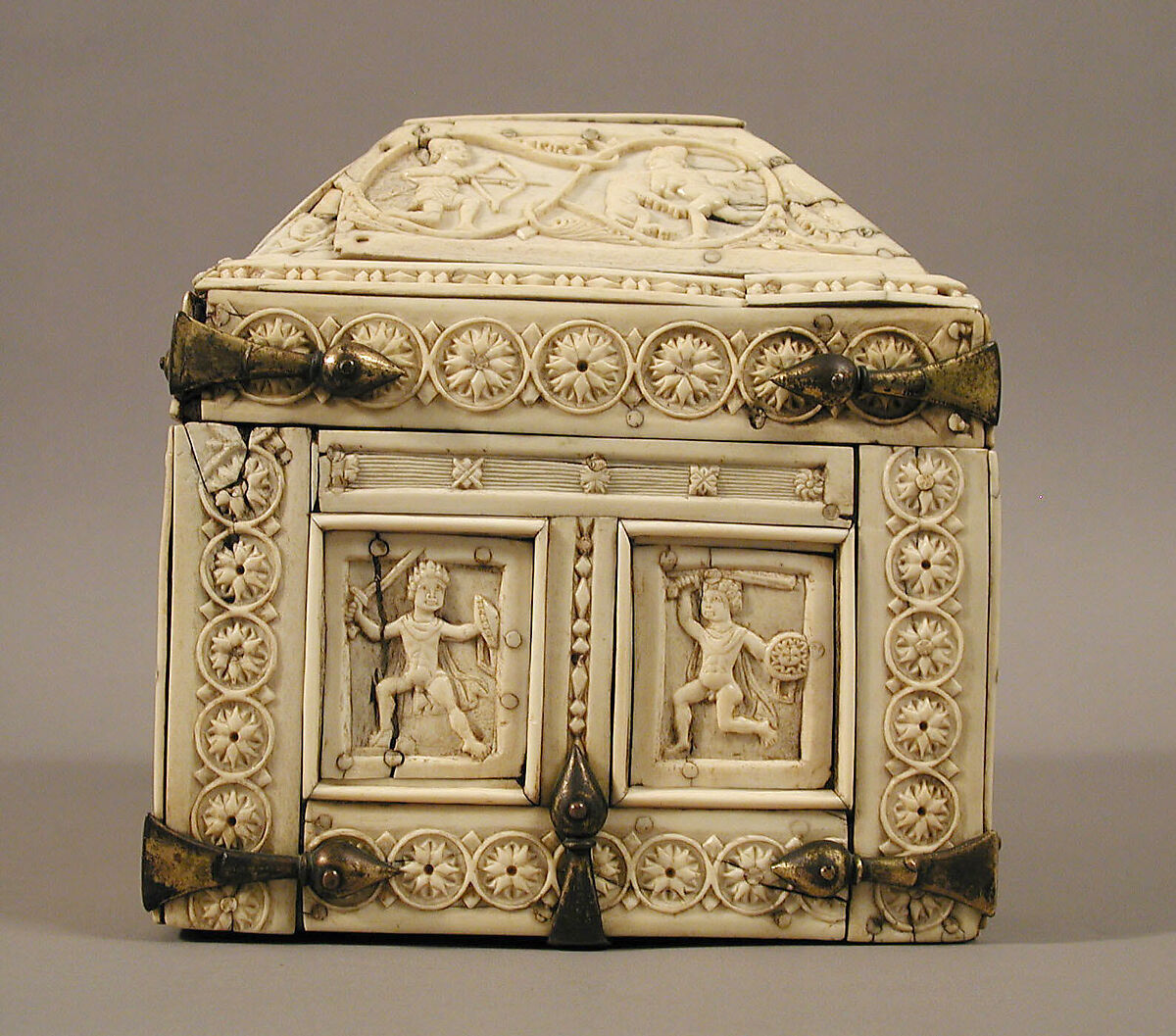 Casket with Warriors and Dancers, Elephant ivory and bone; gilded copper mounts, Byzantine
