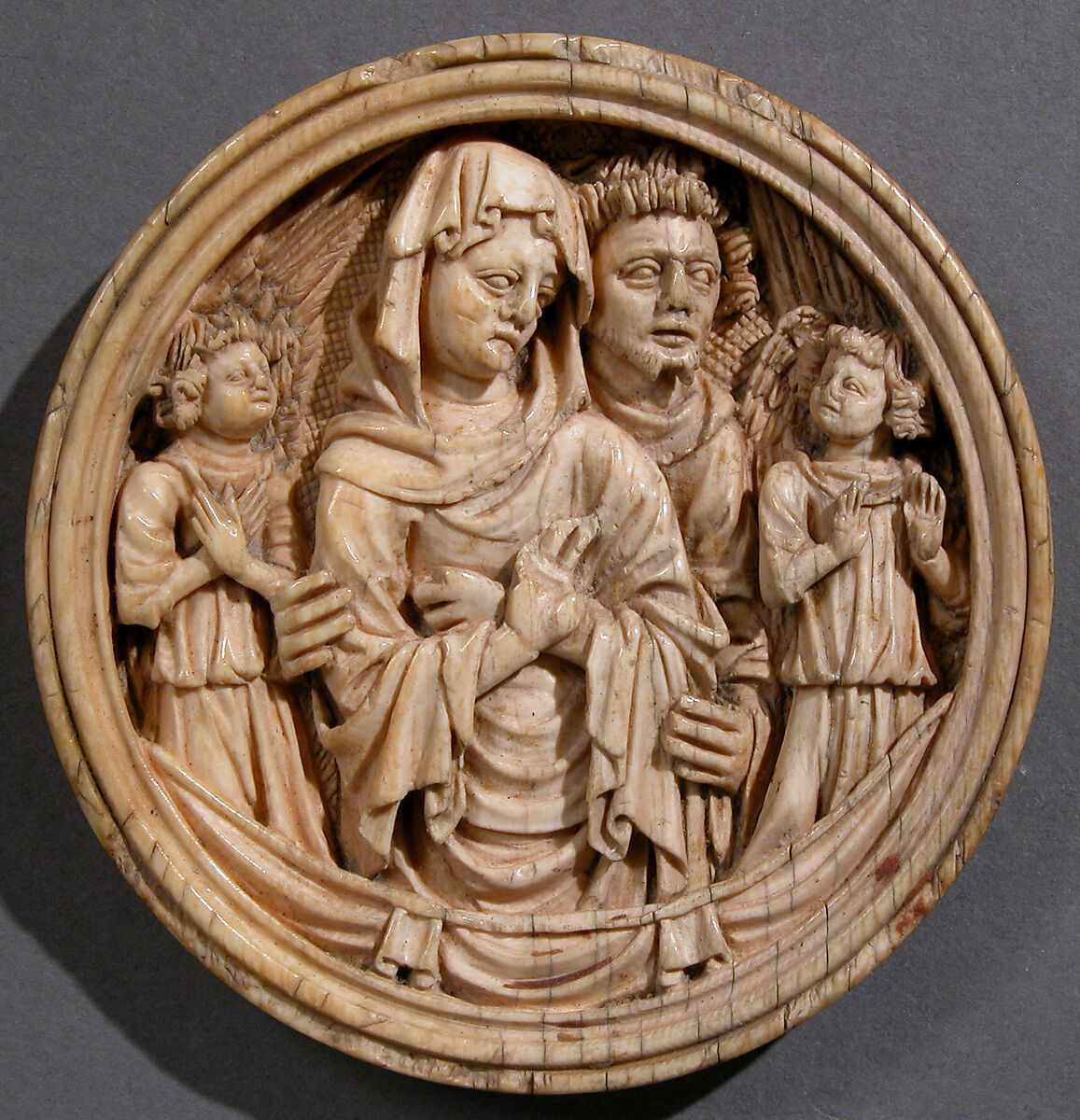 Roundel with the Virgin Mary, Saint John, and Angels, Elephant ivory, European (Medieval style) 