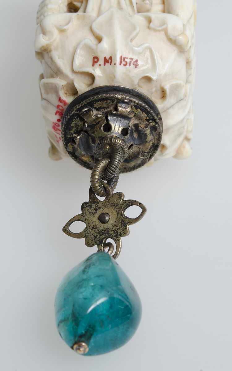 Rosary Terminal Bead with Lovers and Death's Head, Elephant ivory, with emerald pendant, silver-gilt mount, North French or South Netherlandish