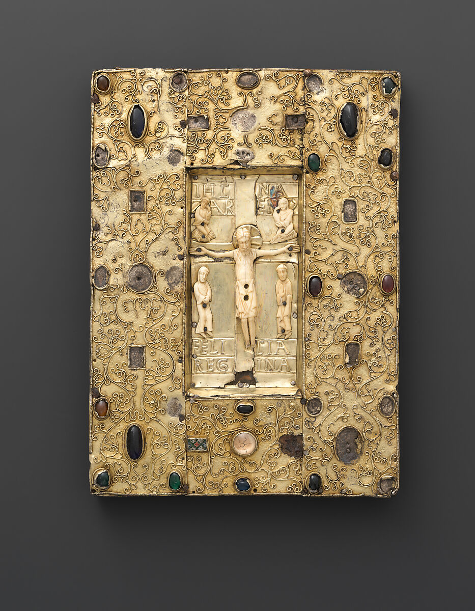 Panel with an Ivory Crucifixion Scene, Silver-gilt with pseudo-filigree, glass & stone cabochons, cloisonné enamel, elephant ivory with traces of gilding on pine support, Spanish 