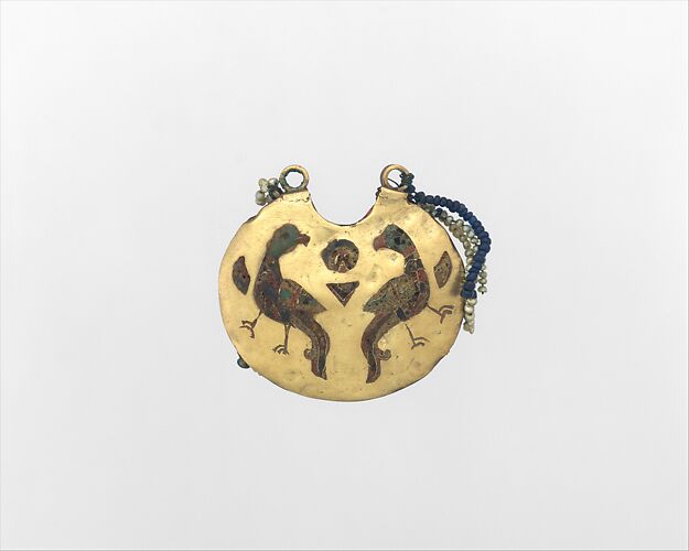 One of a Pair of Temple Pendants, with Confronted Birds (front) and Human Heads (back)