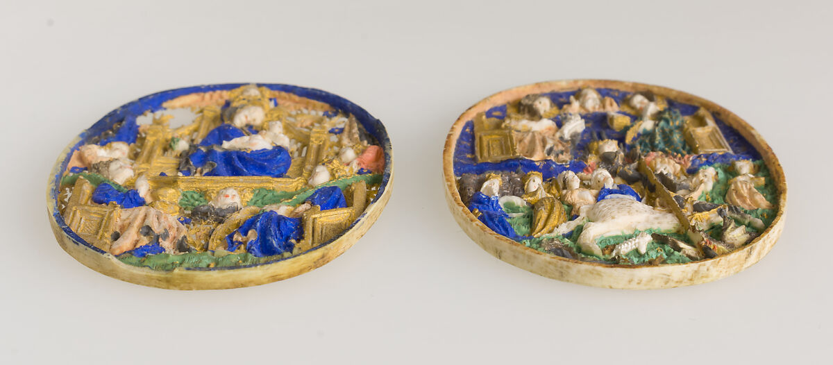 Two Medallions, Elephant ivory, polychromy & gilding, (later mount: gilt silver and glass), French