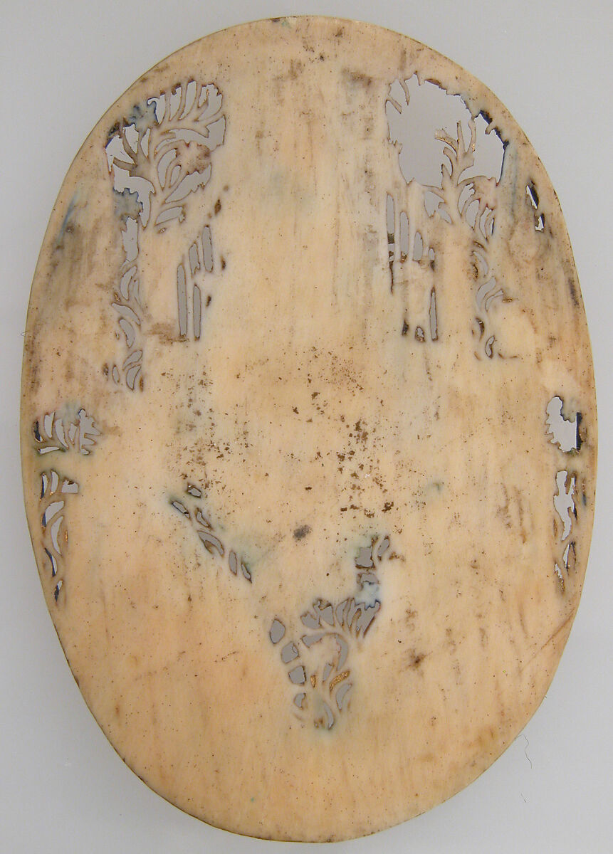 Two Medallions, Elephant ivory, polychromy & gilding, (later mount: gilt silver and glass), French