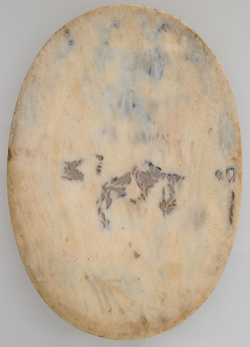 Two Medallions, Elephant ivory, polychromy & gilding, (later mount: gilt silver and glass), French