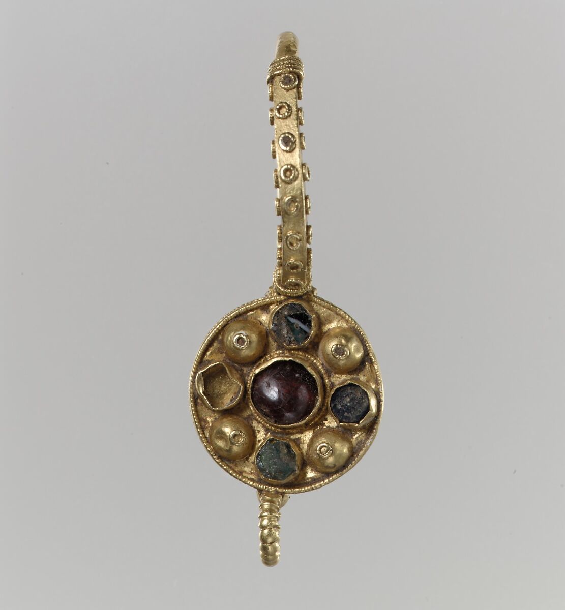 Earring, Gold, garnet, glass; inlays are possible restorations, Langobardic or Byzantine (?) 