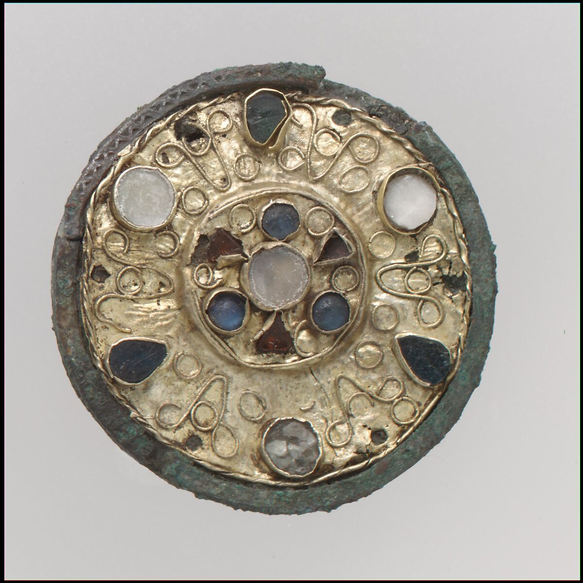 Disk Brooch, Gold, blue and green glass, garnet, mother-of-pearl; silver back, Frankish 
