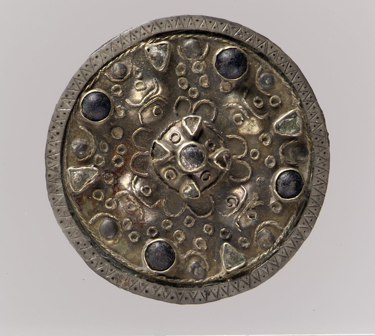 Disk Brooch, Copper alloy, Gold, wire, silver rim, paste cabochons, remnant of iron pin, Frankish 
