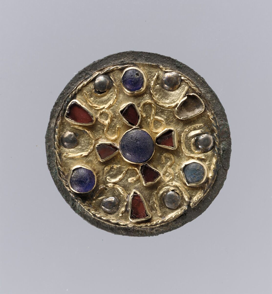 Disk Brooch, Gold, filigree, garnets, blue glass; copper alloy support, Frankish 