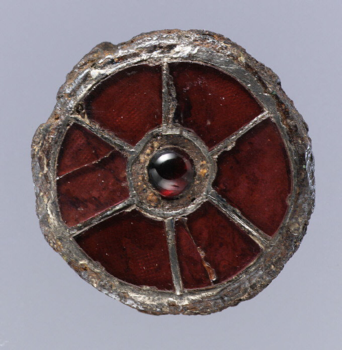 Disk Brooch, Silver, garnets with patterned foil backings, central garnet, Frankish 