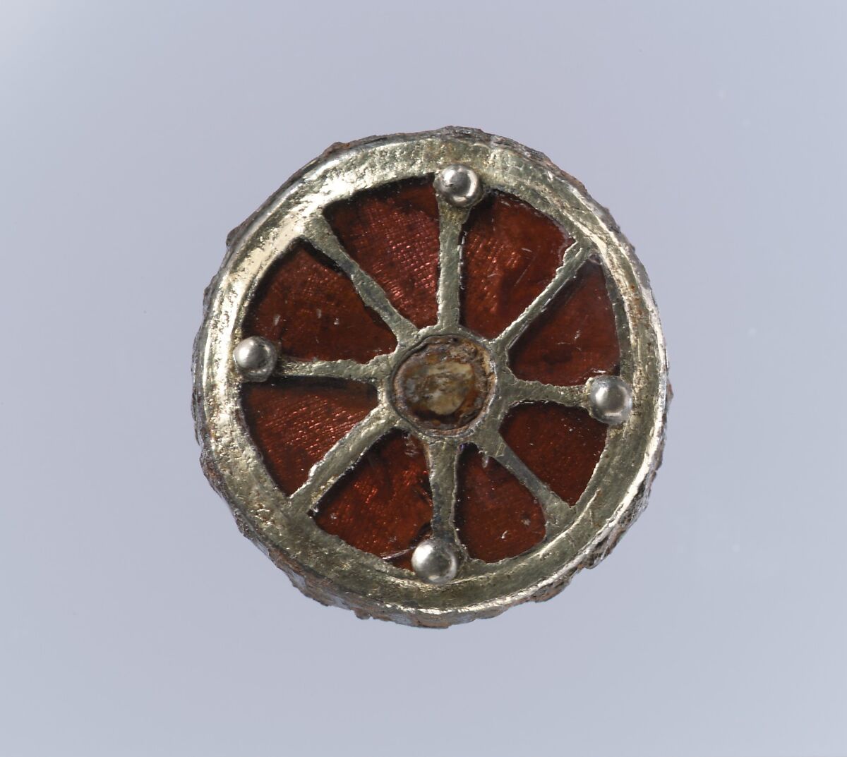 Disk Brooch, Silver-gilt, garnets with patterned foil backings, mother-of-pearl(?).., Frankish 
