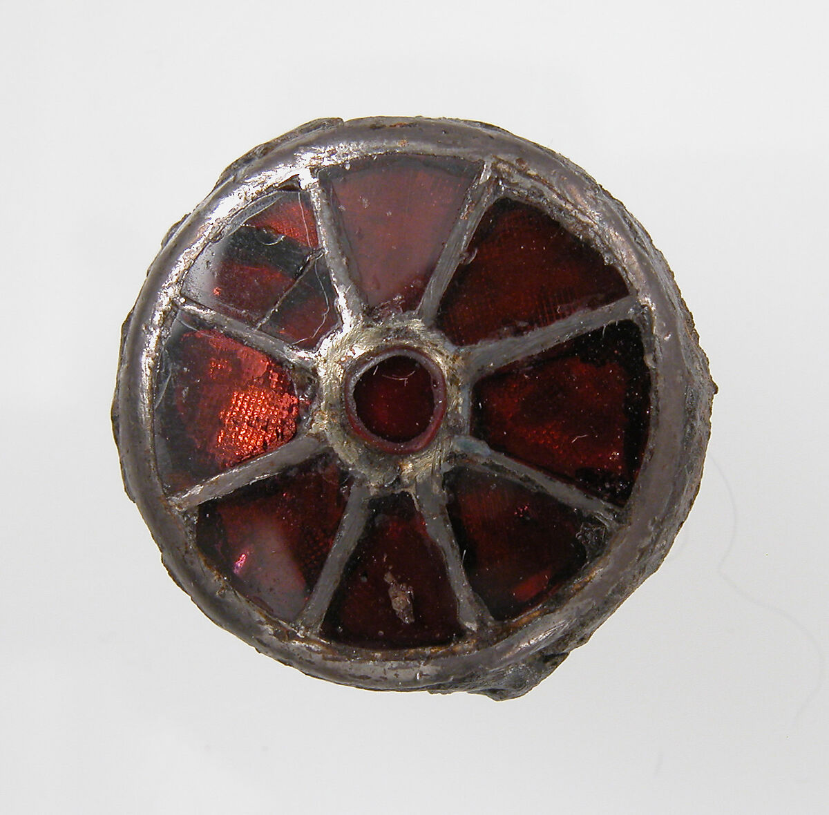 Disk Brooch, Silver over iron core, garnet or glass paste, gold foil, Frankish 
