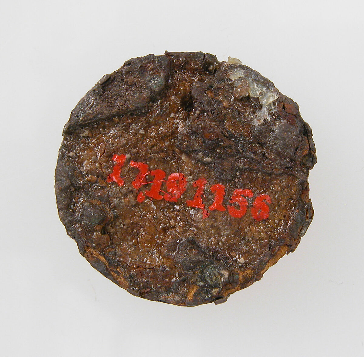 Disk Brooch, GIlded silver, paste or garnet, iron core, and metal foil, Frankish