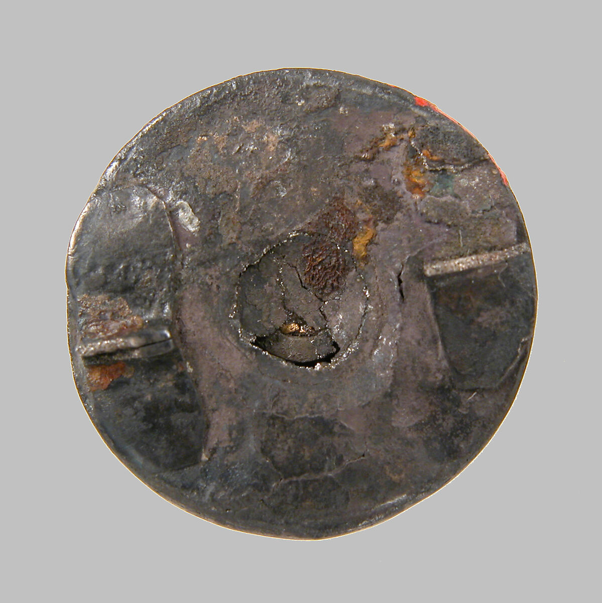 Disk Brooch, Silver, glass paste or garnet, cabochon, metal foil, gold wire, niello?, Frankish