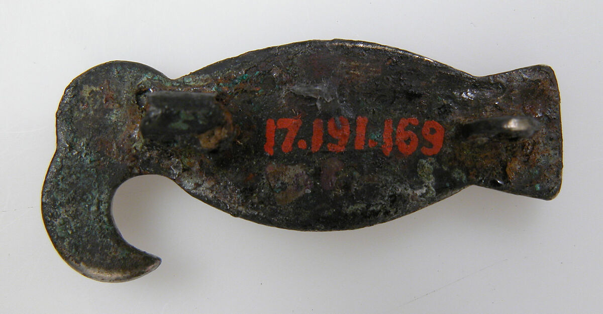Bird-Shaped Brooch, Gilded silver and garnets with patterned foil backings, Frankish