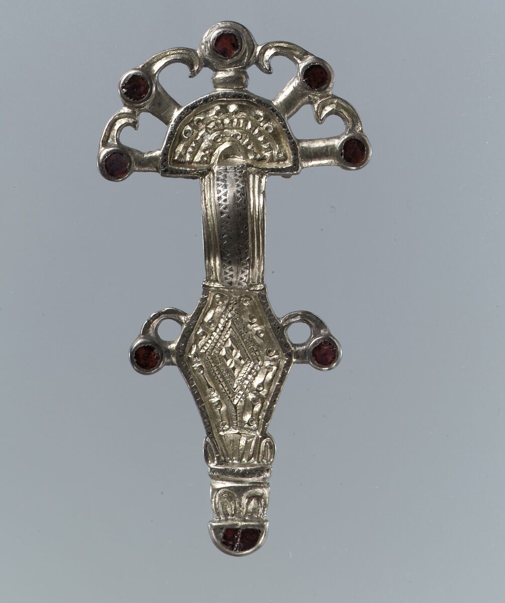 Bow Brooch, Silver-gilt, niello, garnets, Frankish