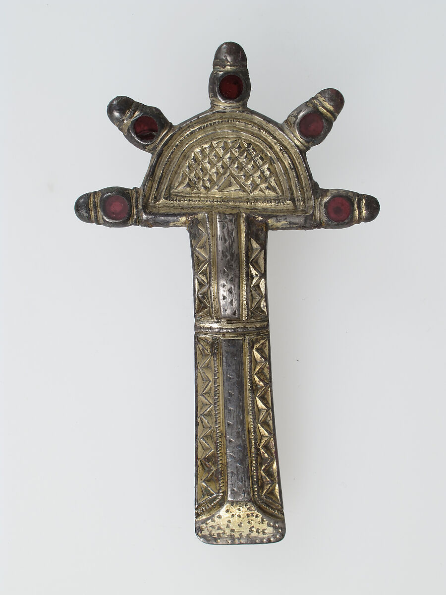 Bow Brooch, Silver-gilt, niello, garnet, iron pin, Frankish